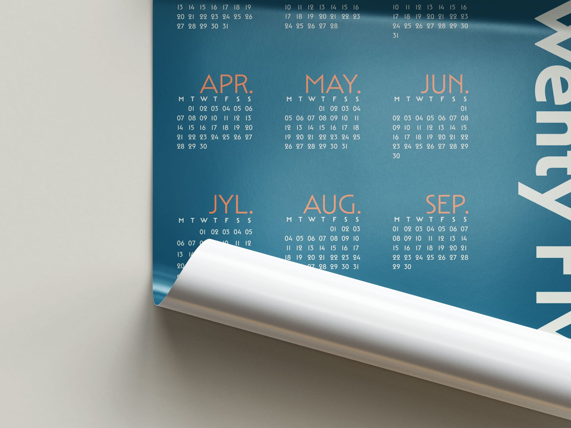 Close-up of the 2025 calendar poster featuring April to September with curved bottom corner showing texture and fold Close-up of the 2025 calendar poster featuring April to September with curved bottom corner showing texture and fold